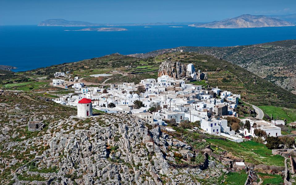 Amorgos steeped in the azure of the waves and the froth of the sea