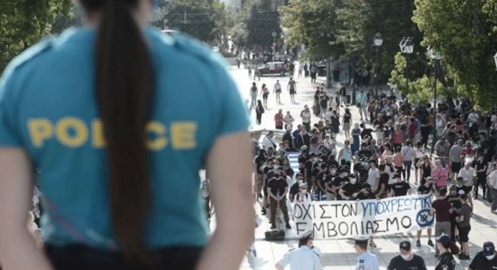 Anti-vax protest front of Greek parliament turns violent; riot police intervene