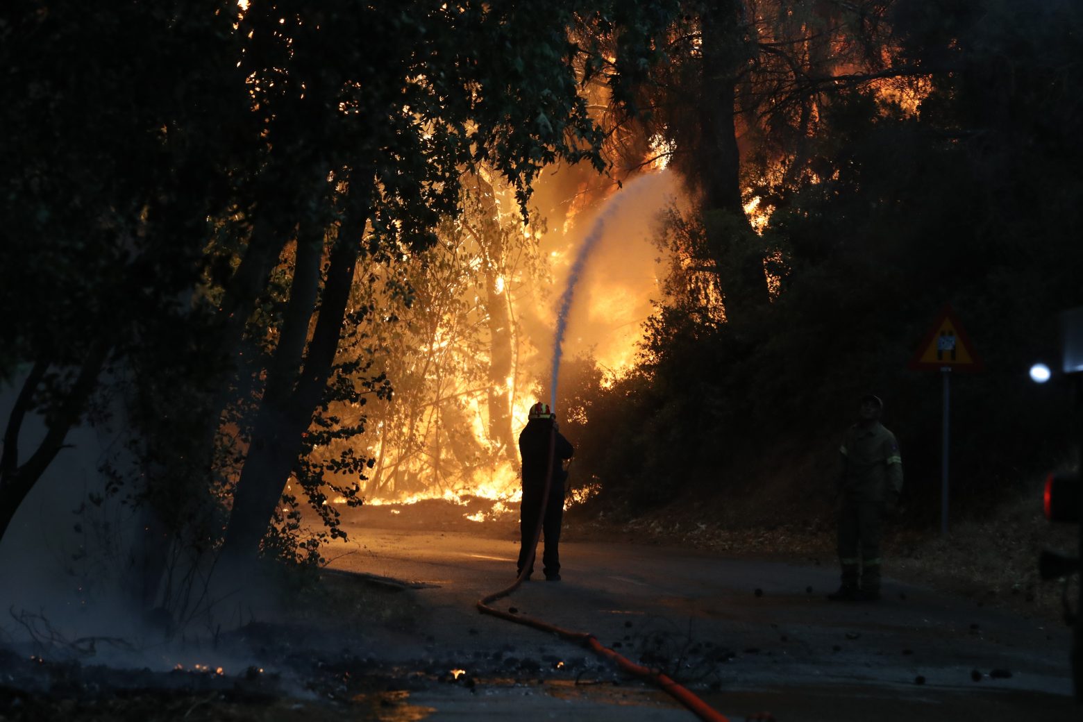 Seven major wildfires rage across Greece on Tues.