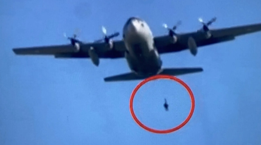 Greece: Parachute mishap leaves commando dangling outside plane for four minutes
