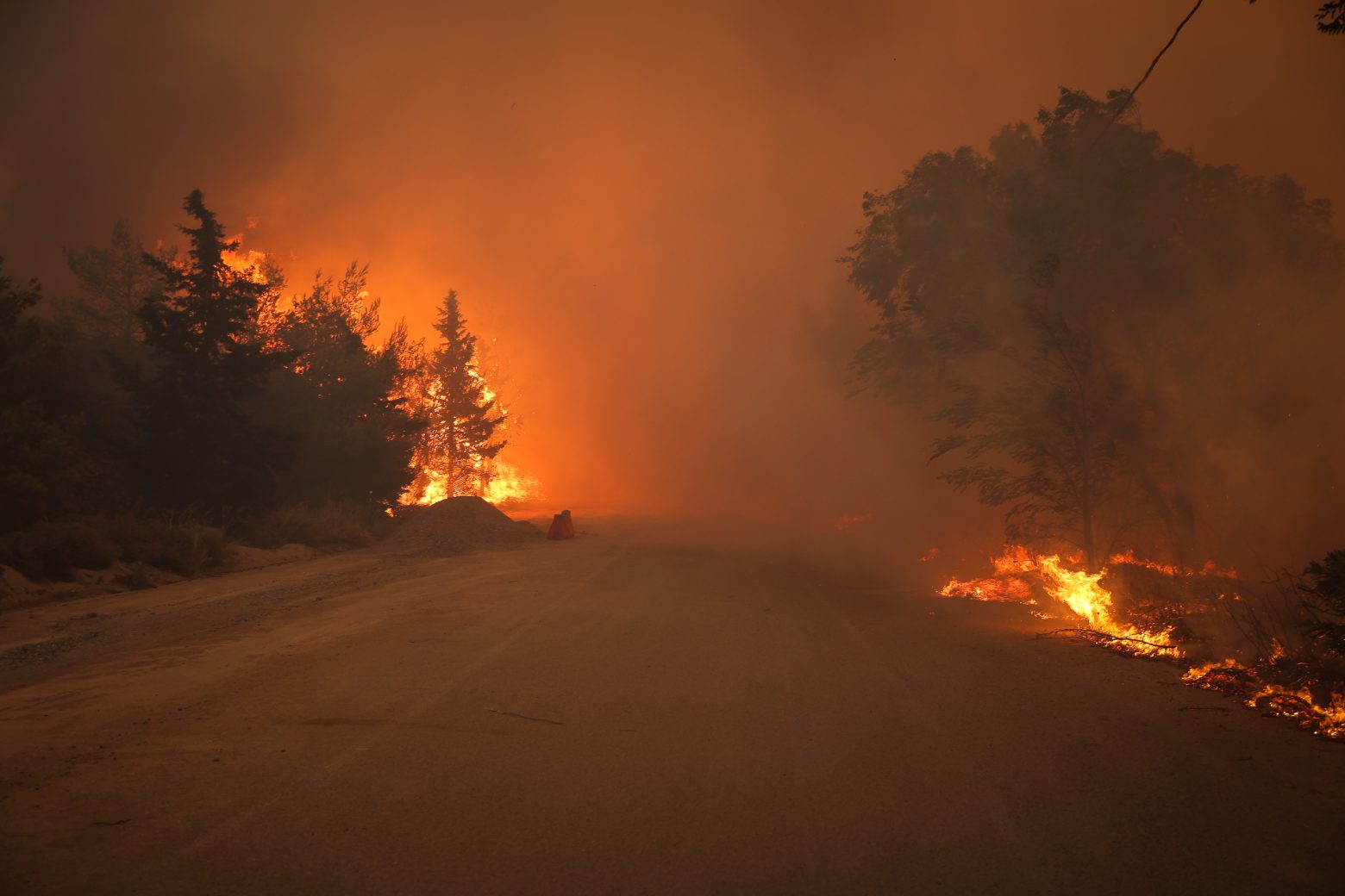 Emergency crews in Greece concentrate on preventing rekindling of wildfires on Fri.