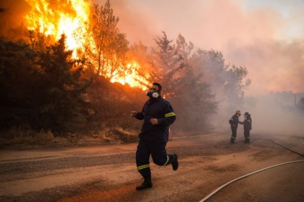 Strong winds continue to fuel wildfire front northeast-east of Athens