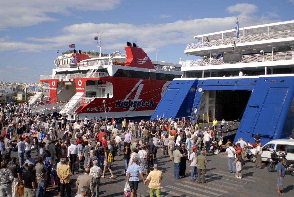 July holidaymakers streaming out of Athens