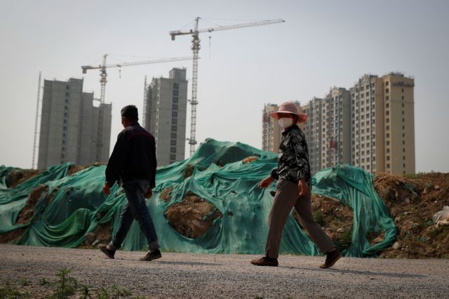 Κίνα: Θα αφήσει τους κατασκευαστές ακινήτων να χρεοκοπήσουν