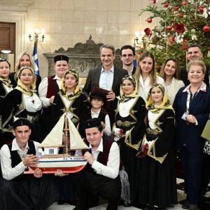 Festive Carols and Holiday Cheer at Greece’s Political Hubs