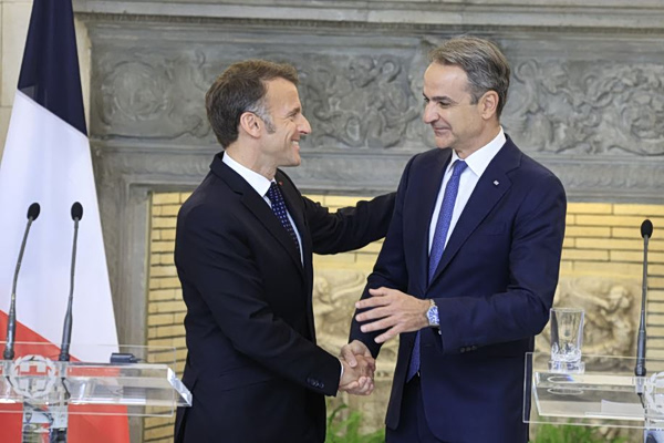 Macron Highlights Greece Ties in Song and Naval Post