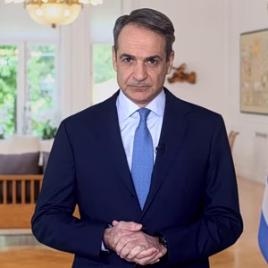 Greek PM Announces Relief Package as Budget Surplus Hits 4.9% GDP